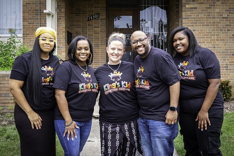 From left: King's Kid Christian Daycare staff members Lolita Granger, Tamara Jones, Megan Johnson, Matt Jones and Adrian Robison pose for a portrait in front of the Detroit child care center Wednesday, July 17, 2024.