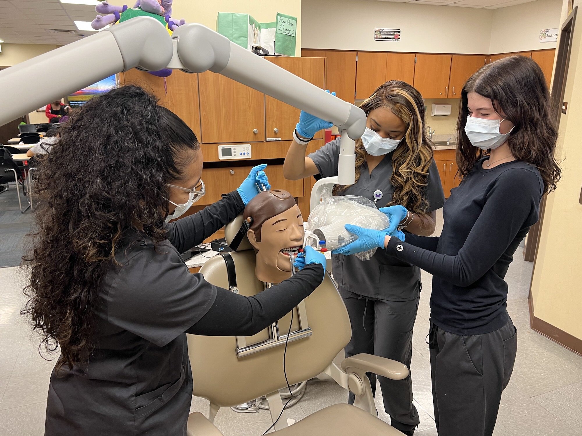 Students receive dental hygiene training through the Warren Arts & Education Foundation program.