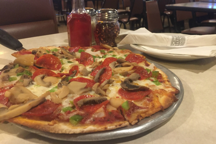 The thin crust pizza is the crowd-pleaser at Luigi's in Flint—made the same since 1955.