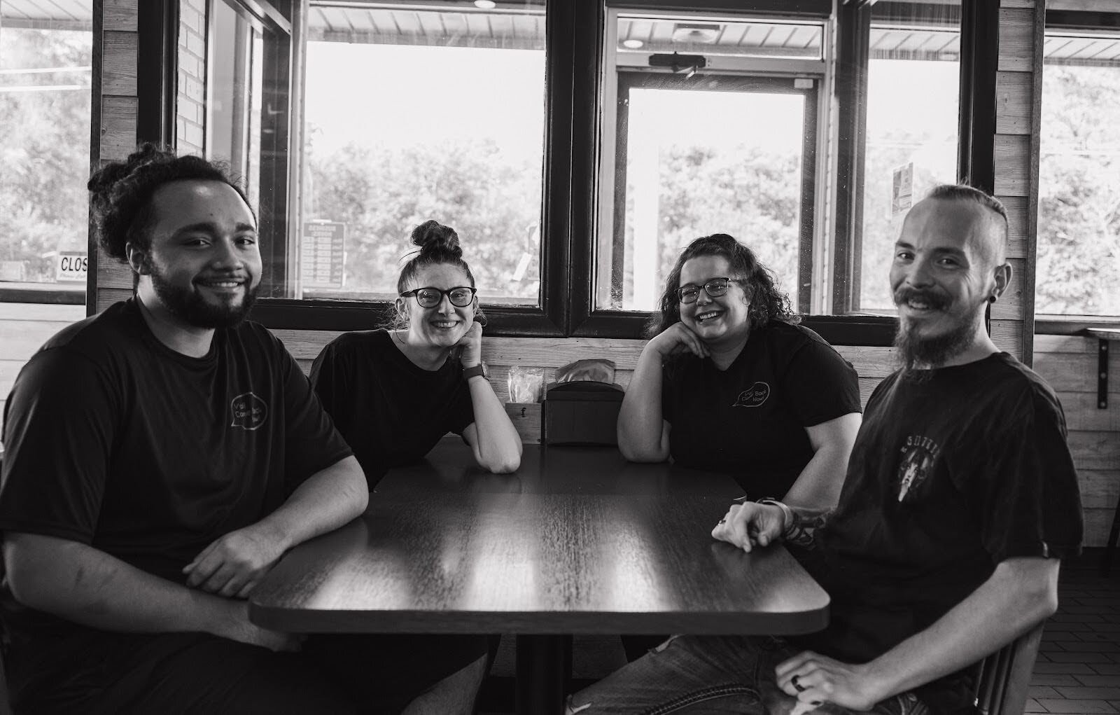 Pictured with staff members, co-owner Ron Housley of Maude's Alabama BBQ (far right) discusses the beauty of resilience, the power of family, and providing Southern hospitality on the east side of Flint. 