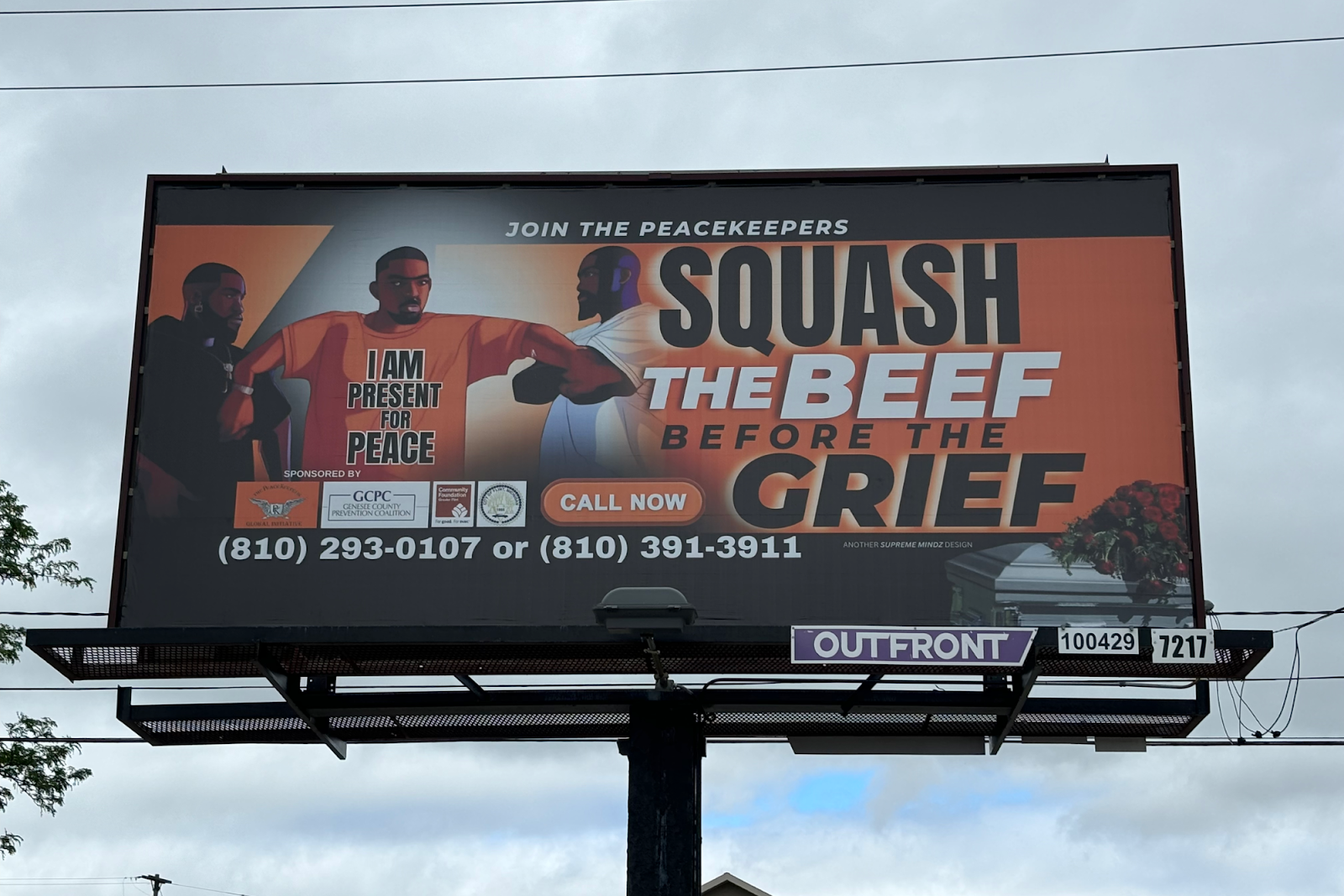 The Peacemakers' 'Squash the Beef Before the Grief' billboard stands tall on Flushing and Ballenger Hwy on May 31, 2024. 