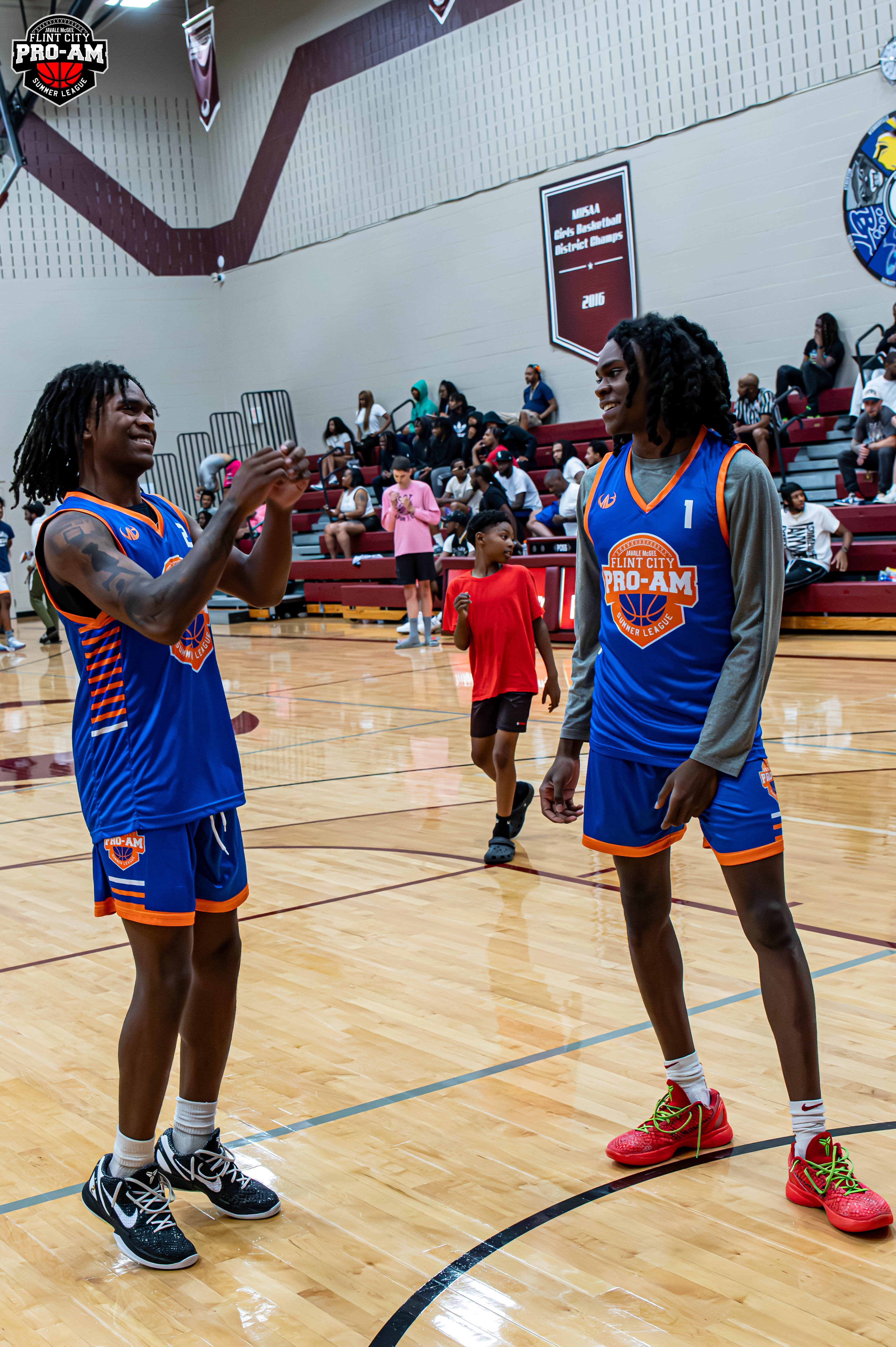 Brothers Keyon Menifield Jr. (right) and Keyonta Menifield warm-up for Team Bridges at the JaVale McGee 2024 Flint City Pro-Am.