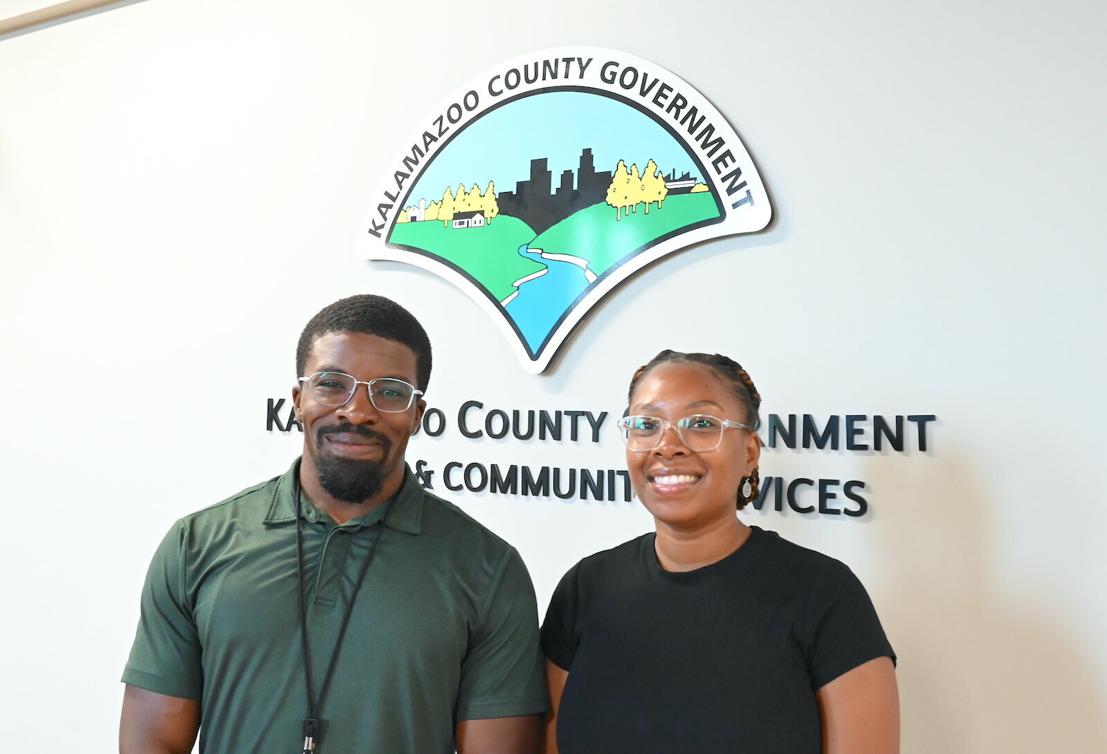 Derek Miller, program supervisor for Kalamazoo County’s Healty Babies Healthy Start & 4Dad Fatherhood Program, with Sidni Miller, community health worker, inside Kalamazoo County’s Health and Community Services building.