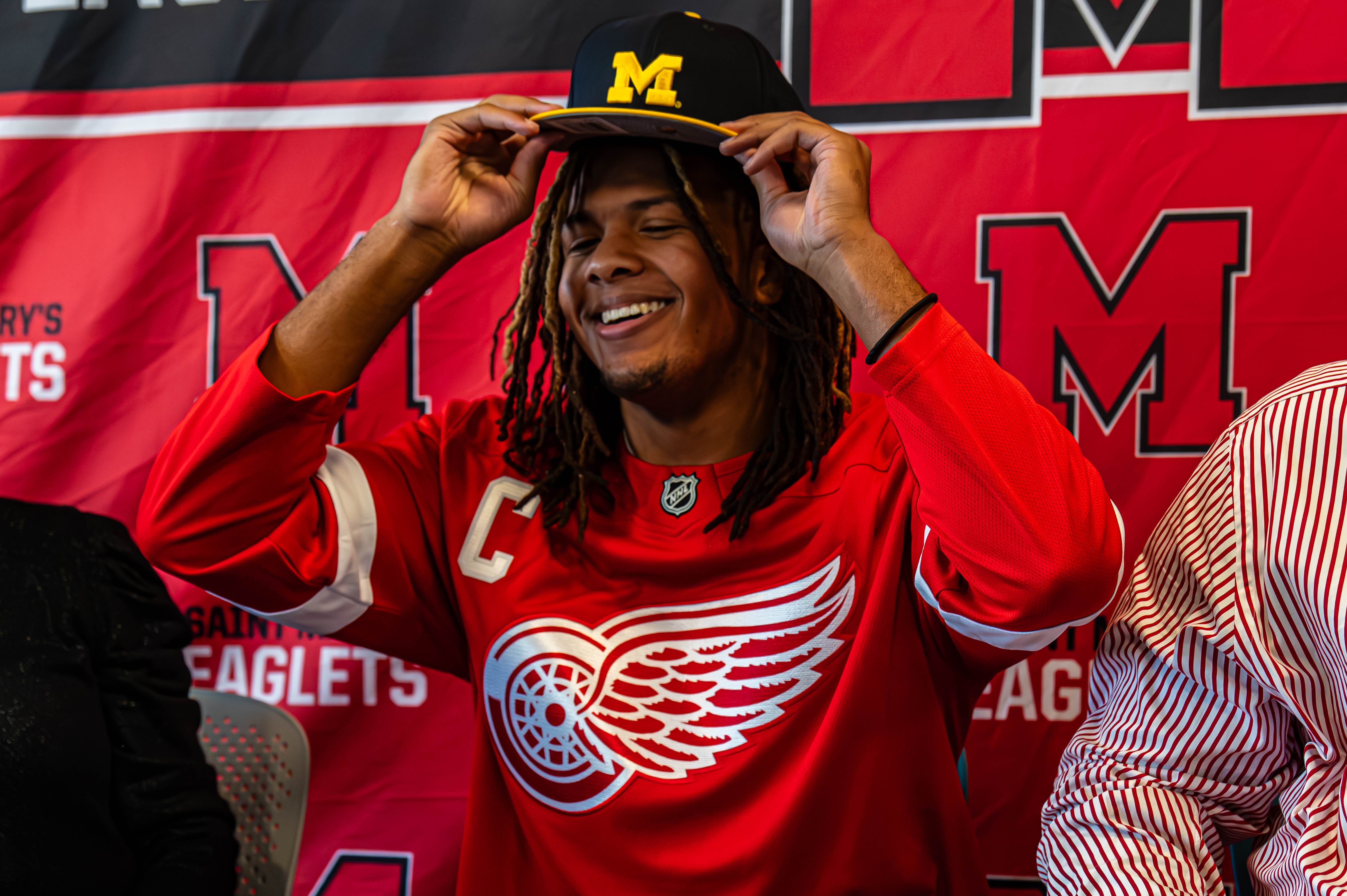 Last month, Flint native Trey McKenney announced his commitment to the University of Michigan at the Gloria Coles Flint Public Library with family and friends in attendance. 